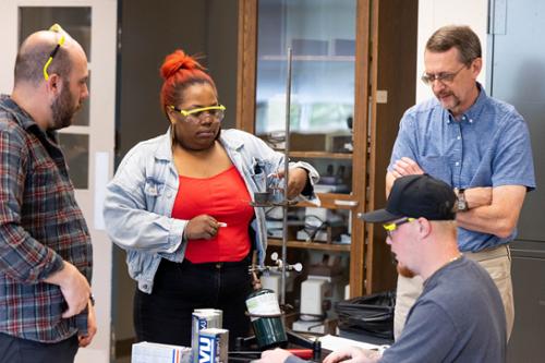 Kerry McMahon working with students during a lab